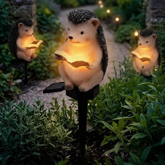 Solar Powered Warm‑White LED Reading Hedgehog Garden Stake Light ‑ Weatherproof Flower Bed & Yard Lighting