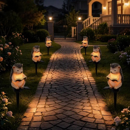 Solar Powered Warm White LED Reading Hedgehog Garden Stake Light  -  Weatherproof Flower Bed & Yard Lighting