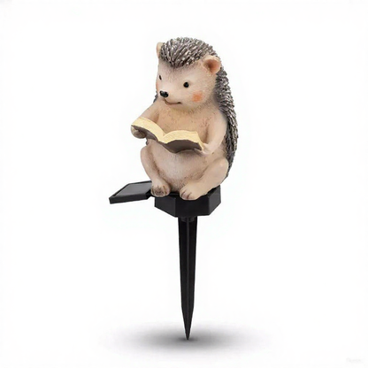 Solar Powered Warm White LED Reading Hedgehog Garden Stake Light  -  Weatherproof Flower Bed & Yard Lighting